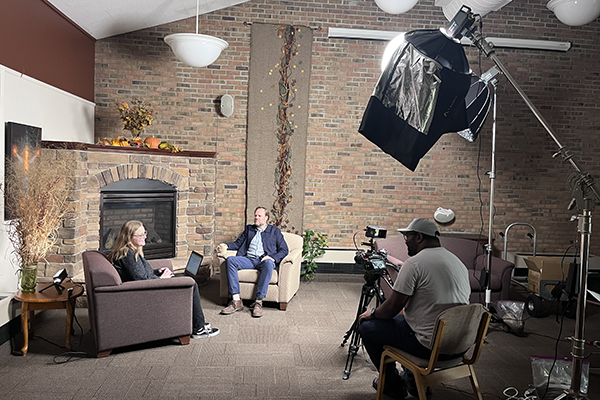 AMBS Master of Divinity student Amy Marshall (at left) interviews Jamie Pitts, PhD, Professor of Anabaptist Studies, for a test episode of the Seminary Reacts podcast on Oct. 31, 2025, while Abenezer Dejene (at right), MDiv, Interim IMS Coordinator and Interim Audio-Video Producer, records the session. (Credit: Annette Brill Bergstresser/AMBS)